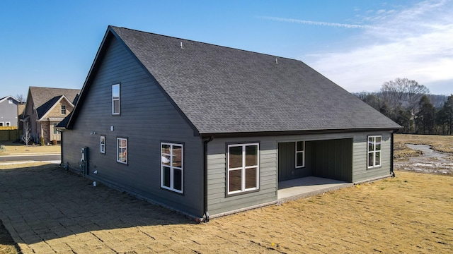 back of property featuring a patio area