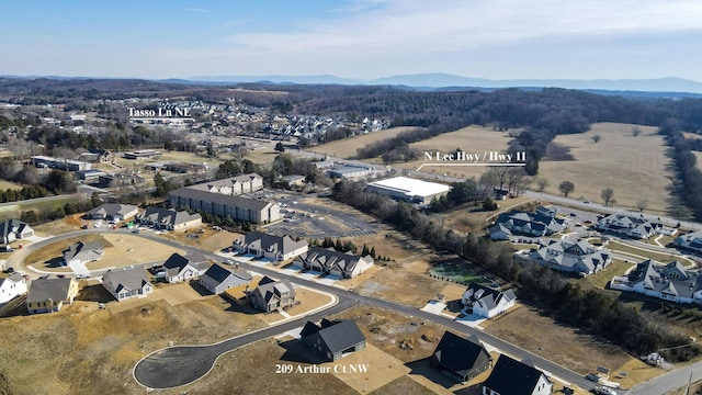 drone / aerial view featuring a mountain view