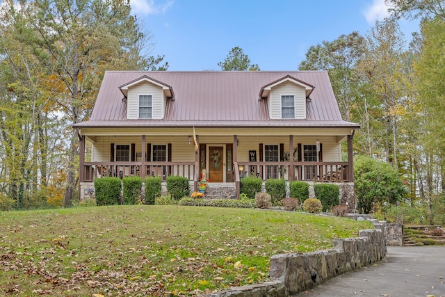 view of front of home featuring a front yard and a porch