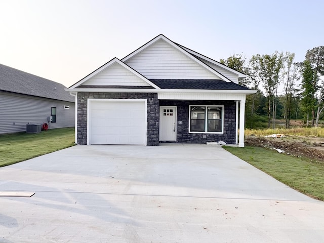 159 Rock Bridge Dr, Ringgold, GA 30736 - view of front of property with stone siding, a garage, concrete driveway, and a front lawn