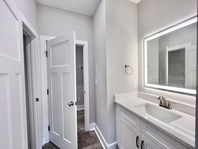 159 Rock Bridge Dr, Ringgold, GA 30736 - bathroom featuring vanity, wood finished floors, and baseboards