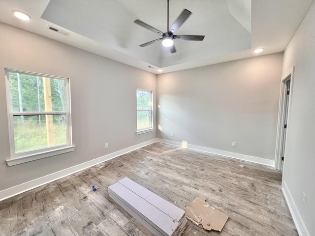 159 Rock Bridge Dr, Ringgold, GA 30736 - unfurnished room featuring a raised ceiling, wood finished floors, a ceiling fan, baseboards, and recessed lighting