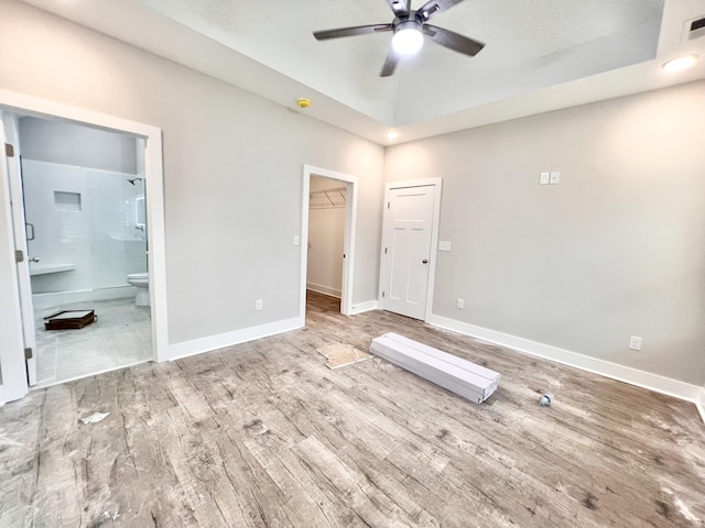 159 Rock Bridge Dr, Ringgold, GA 30736 - unfurnished bedroom featuring wood finished floors, connected bathroom, and baseboards
