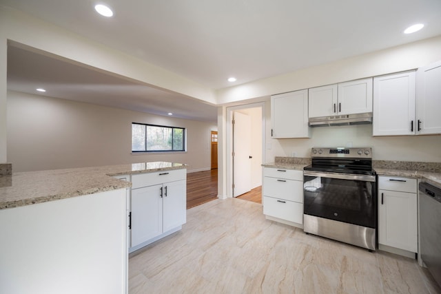 kitchen with white cabinetry, stainless steel appliances, and light stone counters