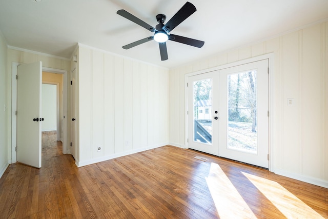 interior space featuring hardwood / wood-style flooring and french doors