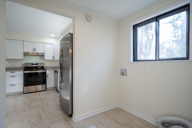 kitchen with light stone counters, appliances with stainless steel finishes, crown molding, and white cabinets