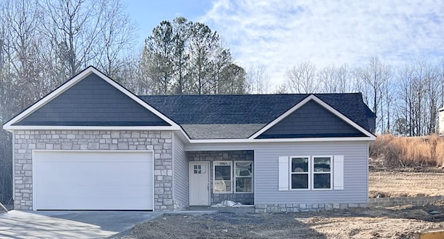 view of front of property featuring a garage