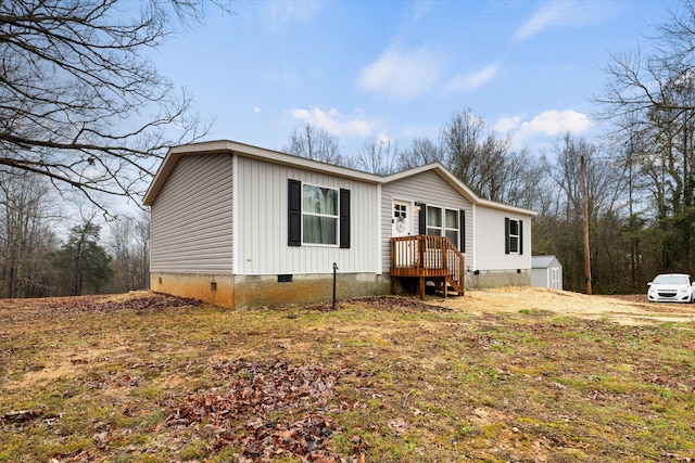 manufactured / mobile home featuring a storage unit