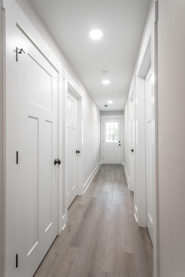 hallway featuring light hardwood / wood-style floors