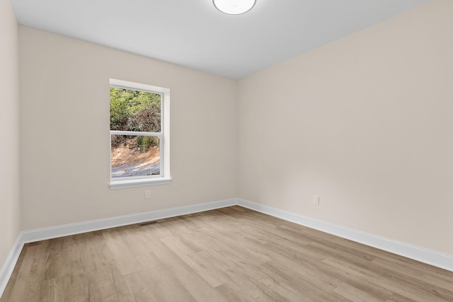 empty room featuring light hardwood / wood-style floors