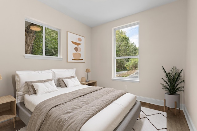 bedroom featuring hardwood / wood-style floors