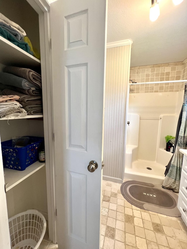 bathroom with walk in shower