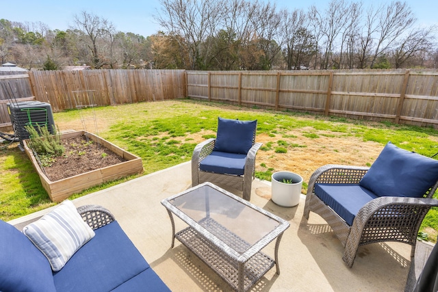 view of patio / terrace with a garden, cooling unit, and a fenced backyard