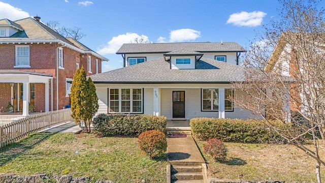 view of front facade featuring a porch and a front yard