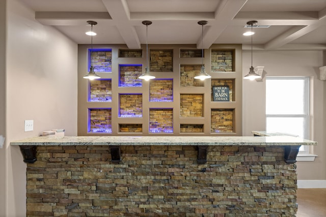 bar with coffered ceiling, beam ceiling, and hanging light fixtures