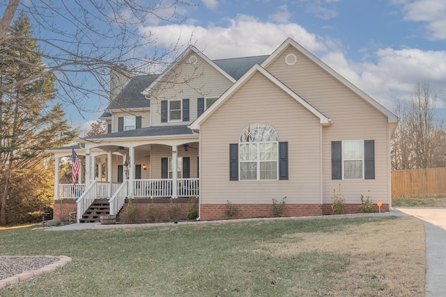 view of front of property with a front lawn and a porch