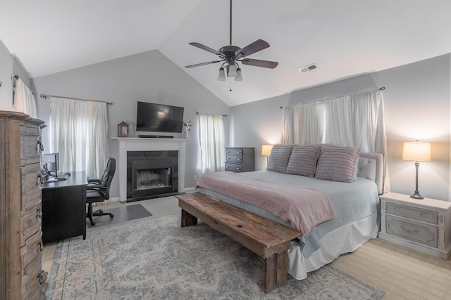 bedroom featuring lofted ceiling and ceiling fan