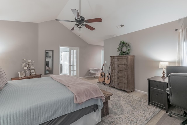 carpeted bedroom featuring ceiling fan and vaulted ceiling