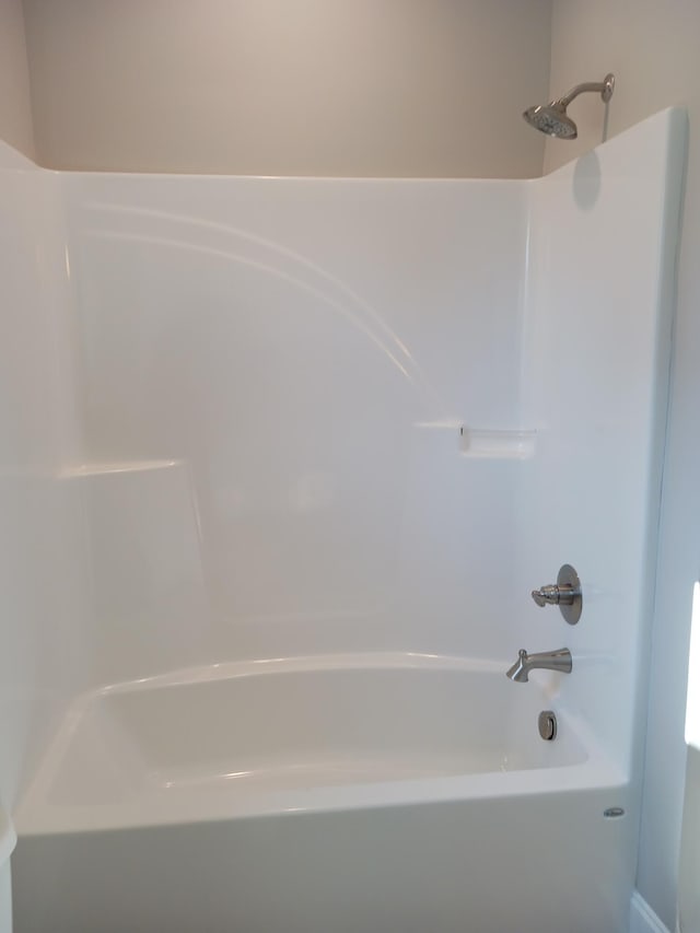 bathroom with shower / bathtub combination