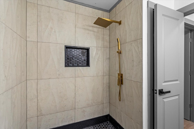 bathroom featuring tiled shower