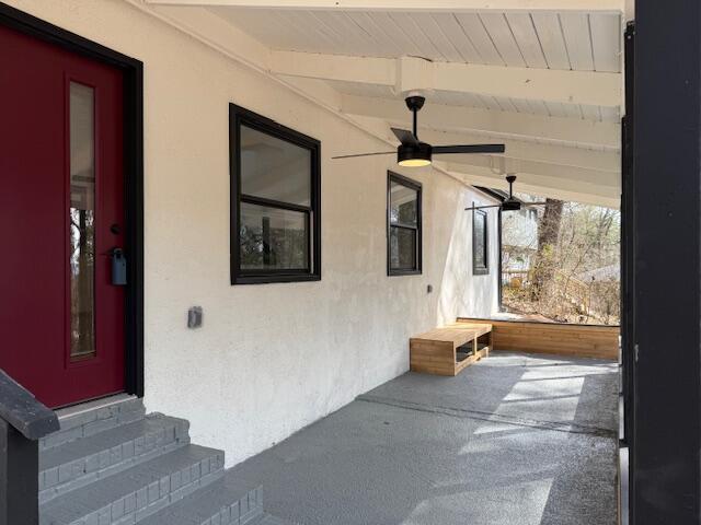 view of patio / terrace featuring entry steps and ceiling fan