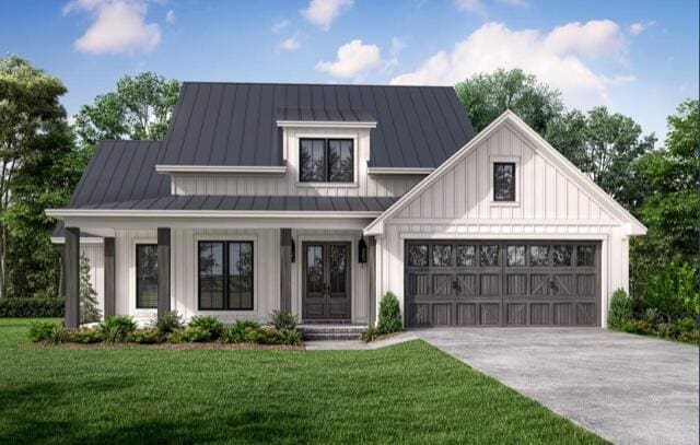 modern farmhouse with a garage and a front yard