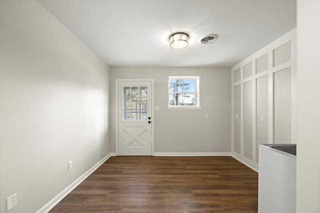 doorway to outside featuring dark hardwood / wood-style floors