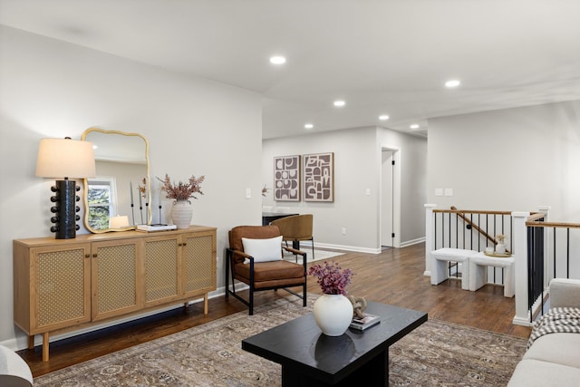 living room featuring dark hardwood / wood-style flooring