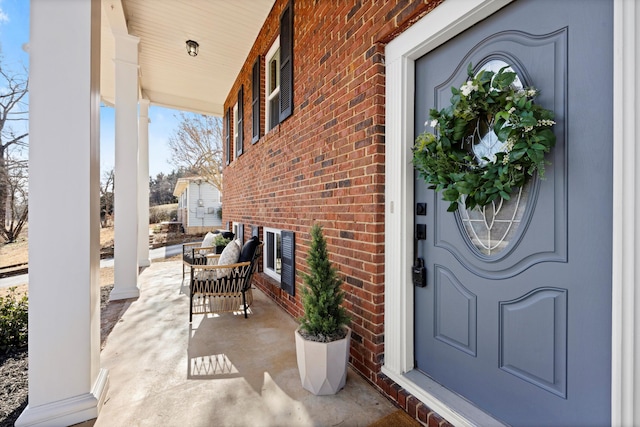 entrance to property with a porch