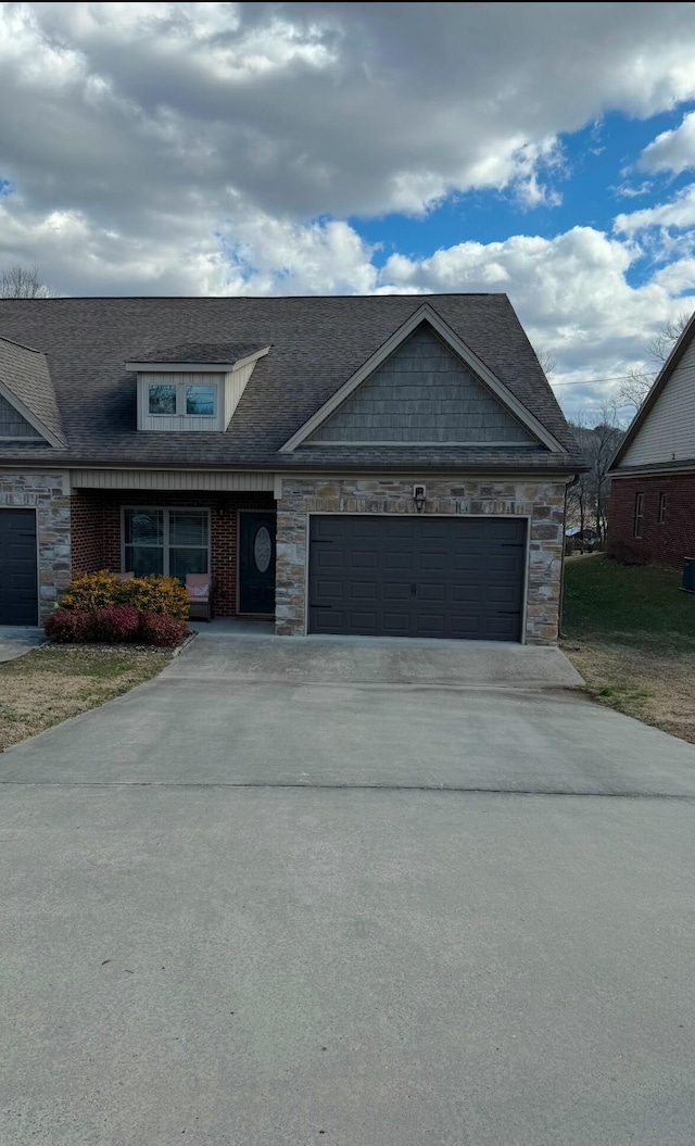 view of front of property featuring a garage