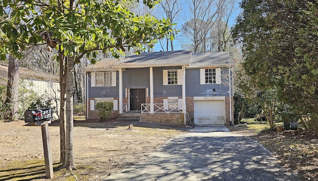 split foyer home featuring a garage