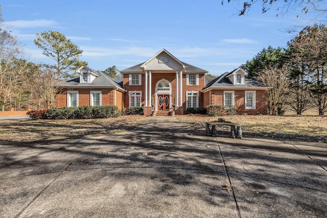 view of greek revival inspired property