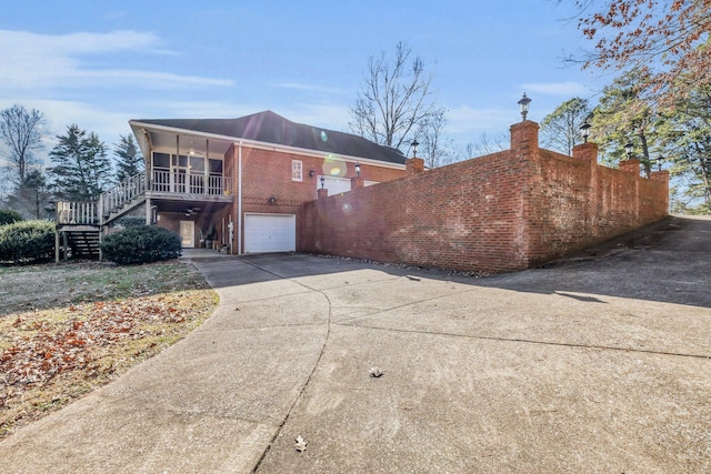 view of property exterior featuring a garage