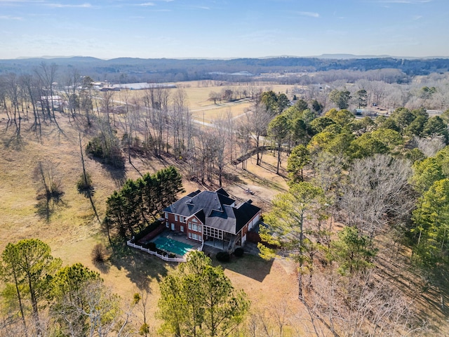 birds eye view of property with a rural view and a mountain view