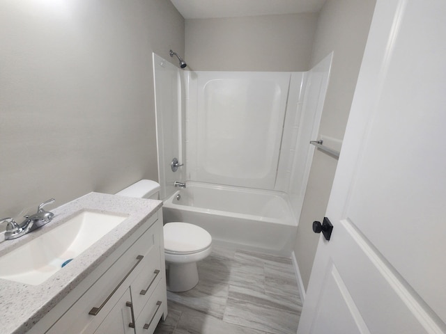 full bathroom featuring vanity, toilet, and bathing tub / shower combination