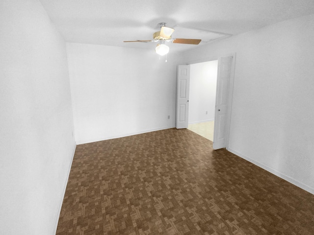 empty room featuring ceiling fan