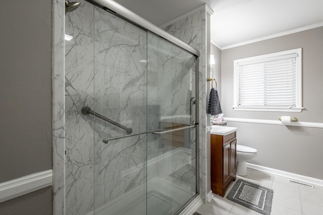 bathroom featuring crown molding, vanity, toilet, and a shower with shower door