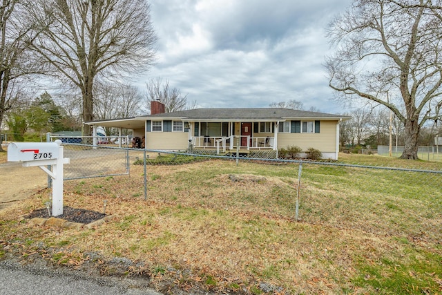 single story home with a front yard, a carport, and covered porch