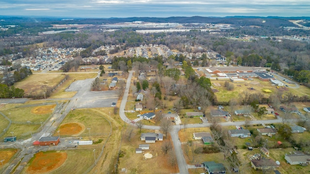 birds eye view of property with a mountain view