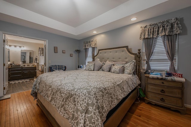 bedroom featuring hardwood / wood-style flooring