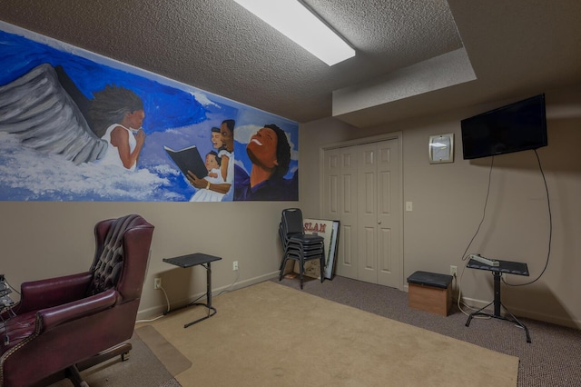 office featuring carpet and a textured ceiling