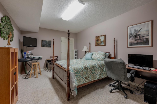 carpeted bedroom featuring a textured ceiling