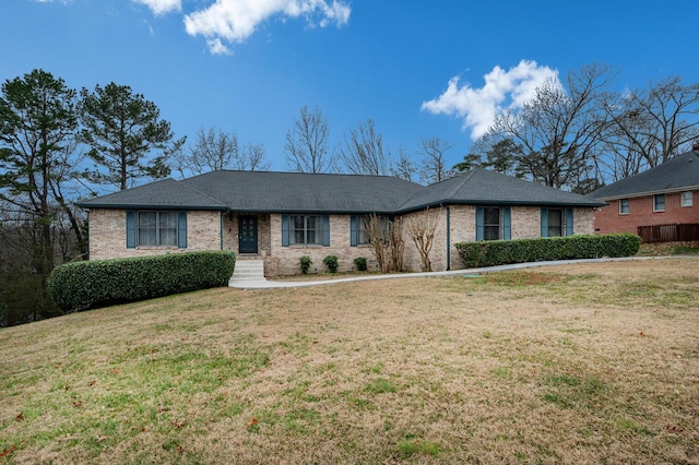 single story home with a front yard