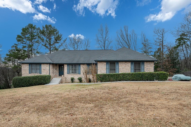 single story home with a front yard