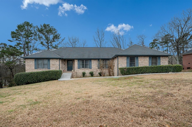 ranch-style house featuring a front lawn