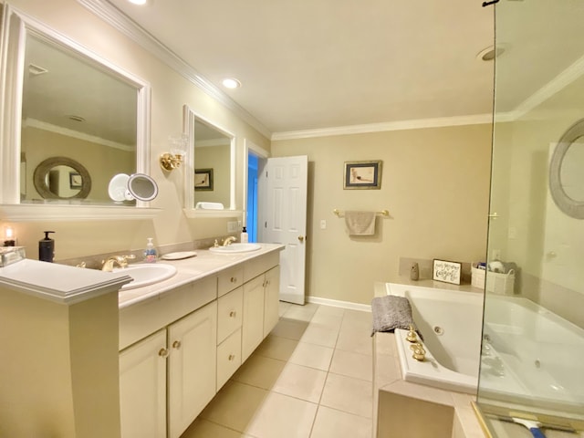 bathroom with tile patterned flooring, ornamental molding, tiled bath, and vanity