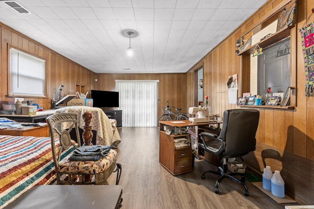 office with hardwood / wood-style flooring