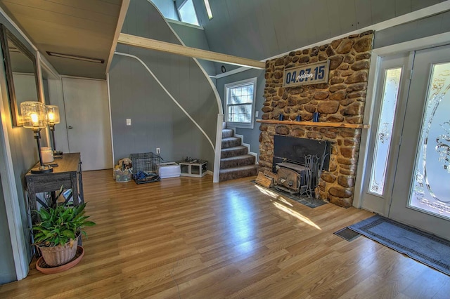 living room with lofted ceiling and hardwood / wood-style floors