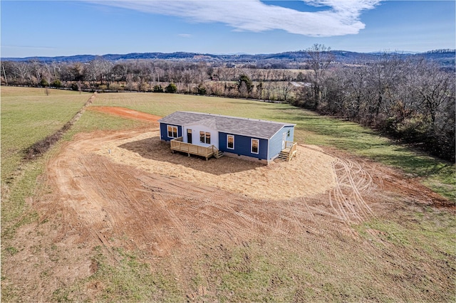 bird's eye view with a mountain view and a rural view