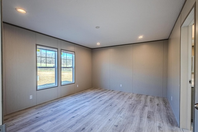 empty room featuring light hardwood / wood-style flooring